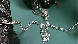 Sexy Sandra in Latex with Two Dildos