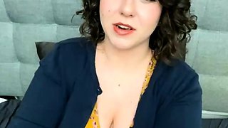 Busty curly brunette with big boobs fucks on couch