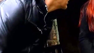 Hot red colored girl stays and enjoys outdoor masturbation