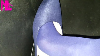 Dangling in Blue Pantyhose and Blue Flats on a Gas Station