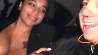 My busty wife gets horny in the car and gives me a blowjob