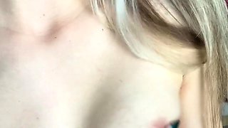 Blonde teen Charlize in hot solo masturbation on her bed