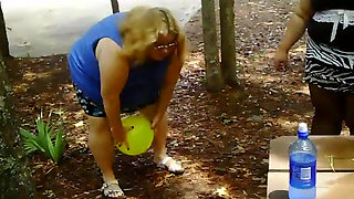 2 bbws are balloon blowing and popping