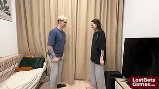 James and Sofia engaged in a strip hand-slap game