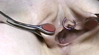 Skinny girl gets pussy pinched while she's tied down