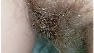 Bushy Pussy Girl Peeing In The Toilet With A Sanitary Pad In Her Panties