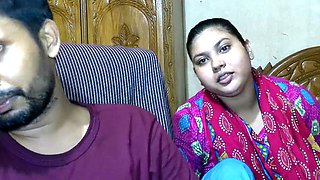 Newlywed couple and their friend getting cozy in an Indian village