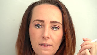 Extreme Close up Blue Eyed Redhead Smoking