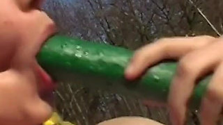I hunt my cunt - young chick makes it with a cucumber dildo in nature