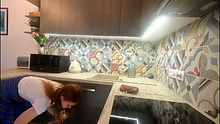 The Juggler Girl Is Here in a Long College Type Uniform Skirt to Flash Her Panties Under Her Miniskirt in the Kitchen