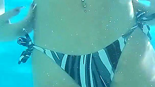 Naughty Brazilian Babe Chilling in the Pool