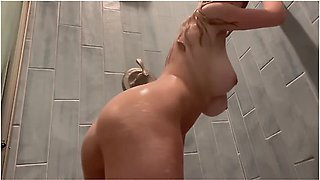 Big Boob Beach Babe Rinses Off In The Shower!