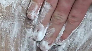 Close-up of Shaving the Vagina with a Trimmer and a Razor