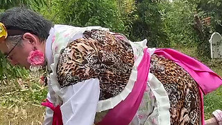 In gardener's outfit with a little leopard dress to pee on all fours