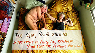 Golden Screen Turkmen State TV Interrupts a Real Mature Couple on Gold Satin Sheets