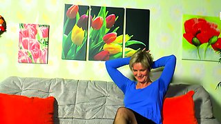 Mature German horny housewife tries a solo masturbation