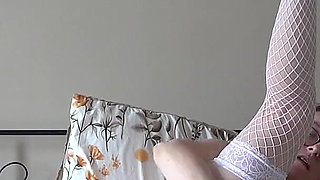 Nurse in White Fishnet Stocking Playing with Vibrator