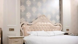 Small titted asian beauty giving blowjob