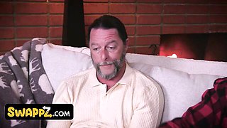 Aria Banks Asia Lee Santa-hat Christmas foursome on the white couch by pink gifts