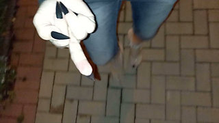 nighttime crossdressing on a public street in 20cm stripper heels, black toes, and black claws