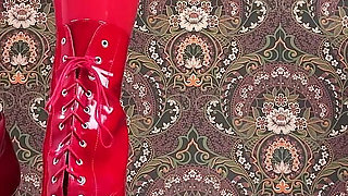 Red Ballet Boots on Wooden Floor