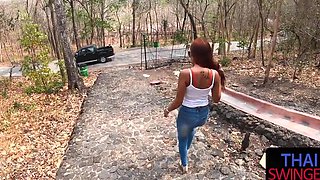 Asian babe in red glassess and jeans gets wild with her Thai lover outdoors