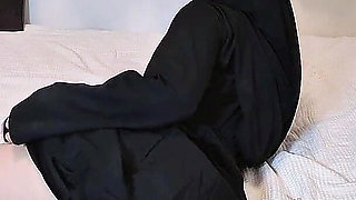 A Naughty Malaysian Hijabi Girl Doing Porn Showing off Her Ass in Abaya