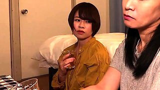 Japanese MILF fingers a naughty lesbian slut