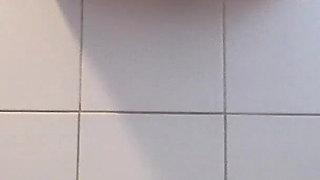 Raven: Peeing in a Glass Bowl While Sitting on the Edge of the Bathtub